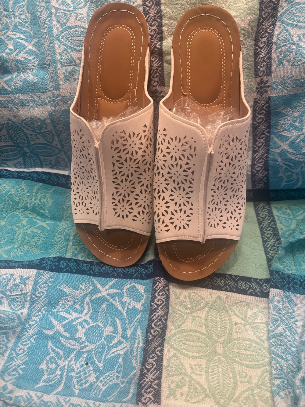 Women's White Laser-Cut Slip-On Sandals Size 9 but they they seem like a size 10